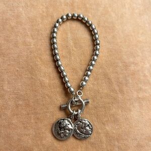 Sterling silver bracelet with silver coins